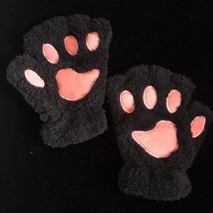 Pink paw gloves never used.